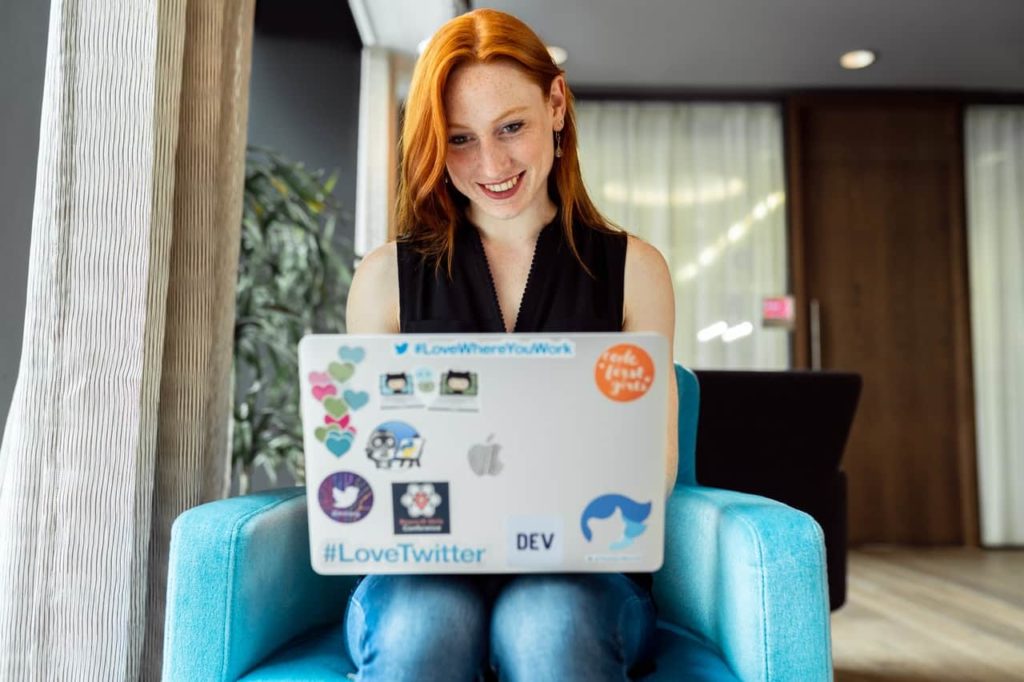 redhead woman with laptop